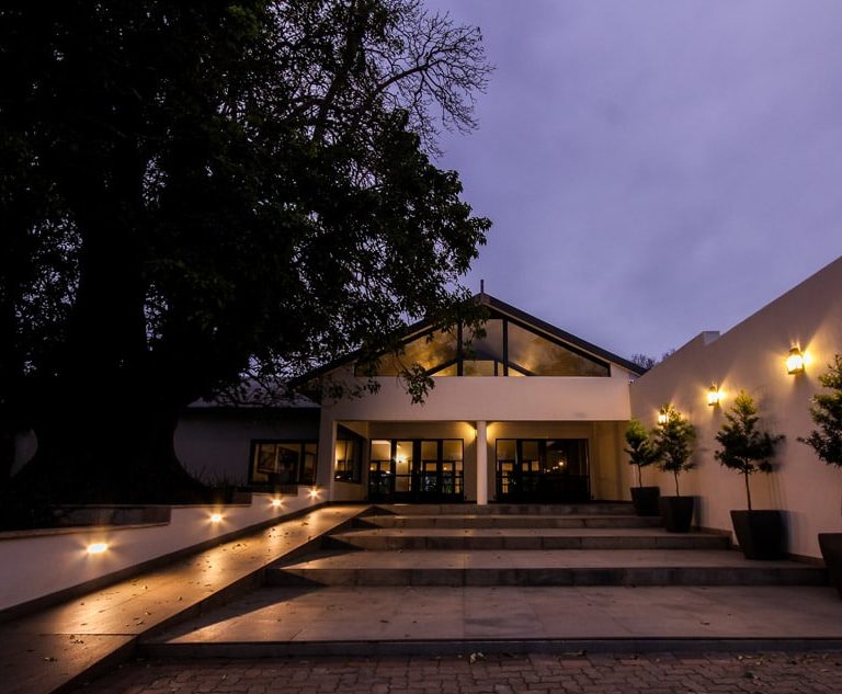 Olivewood Private Estate Clubhouse Front Entrance at Night